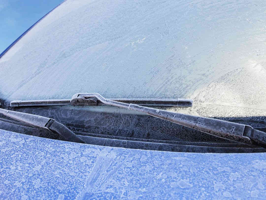car with frozen windscreen wipers