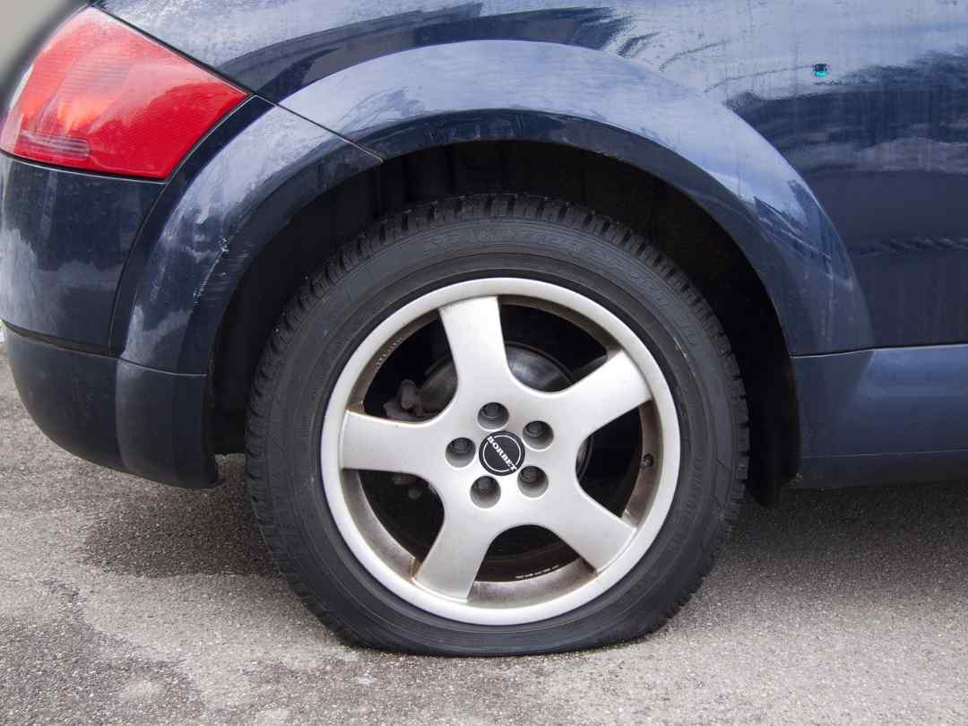 Damaged flat car tyre