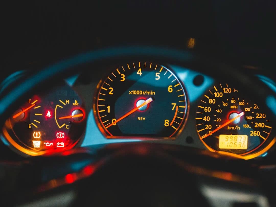 Closeup of dashboard with illuminated warning lights