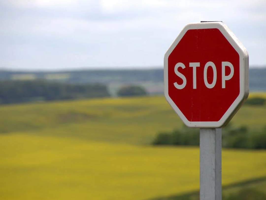 Red stop sign - a flashing or red engine management light means you must pull the car over.